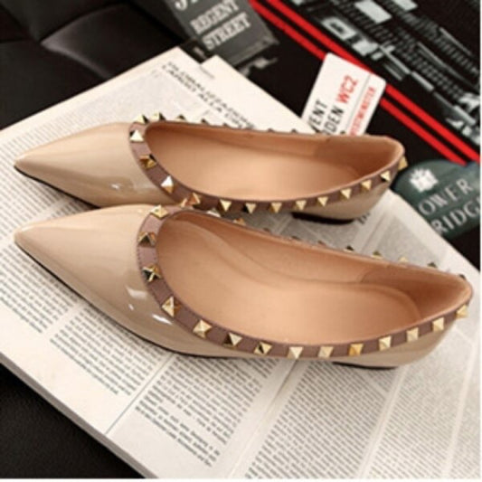 Nude flats with gold rivet studs