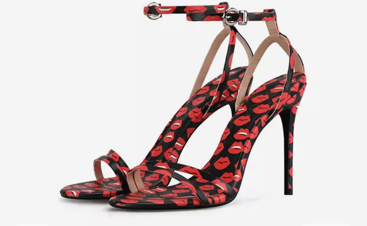 Red and black snakeskin hot sale heels