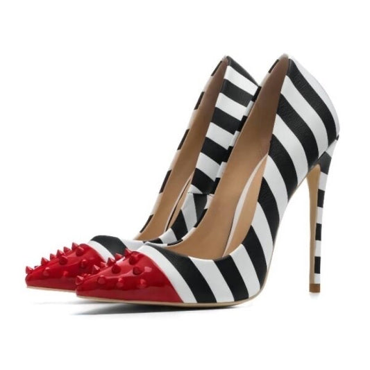 Black and white striped high heeled shoes with red spike tip