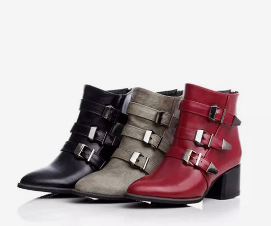 Grey ankle boots with three strap buckles