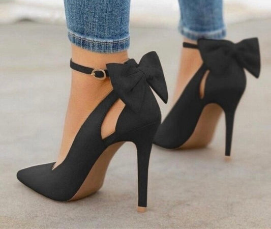 Black high heeled court shoe with bow on back